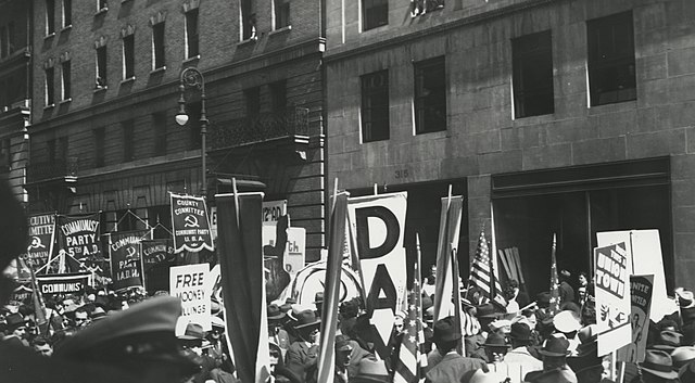 640px May Day parade with banners and flags New York cropped